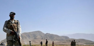 A FC personal standing beside road in Balochistan